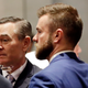 House Speaker Glen Casada, R-Franklin, left, talks with Cade Cothren, right, his chief of staff, during a House session in Nashville, Tenn. Cothren has resigned amid allegations of racist and sexually explicit texts.